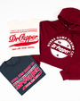 Three graphic tees featuring Dr Pepper and Bubba Gump Shrimp Co. logos, with one hooded sweatshirt in maroon and two tees in cream and gray.