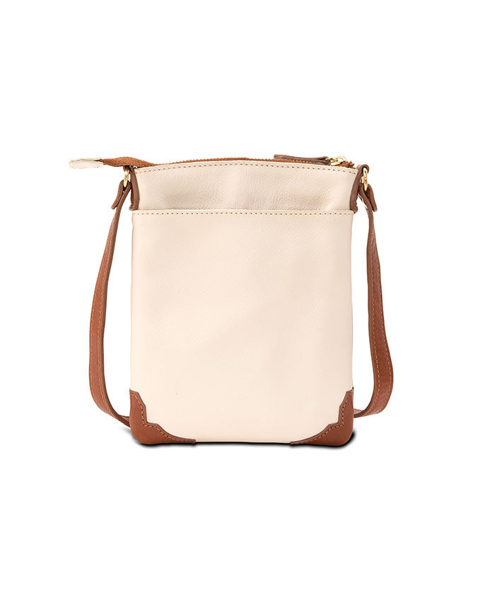 Back view. Cream-colored crossbody bag with a brown bottom corner and strap. The bag features a gold zipper , front pocket and a distinctive gold embellishments.